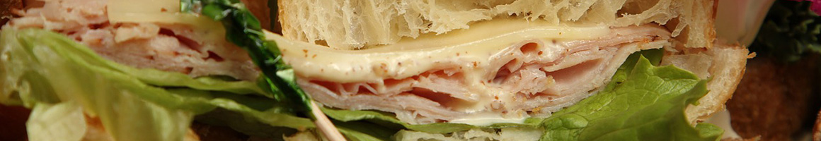 Eating Sandwich Cafe at Fresh Wave Cafe restaurant in West Palm Beach, FL.